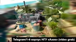 Атака БПЛА на морський порт в окупованому Маріуполі на кадрах відео 1-го корпусу НГУ «Азов»