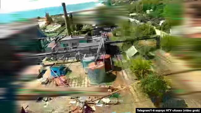 Атака БПЛА на морський порт в окупованому Маріуполі на кадрах відео 1-го корпусу НГУ «Азов»