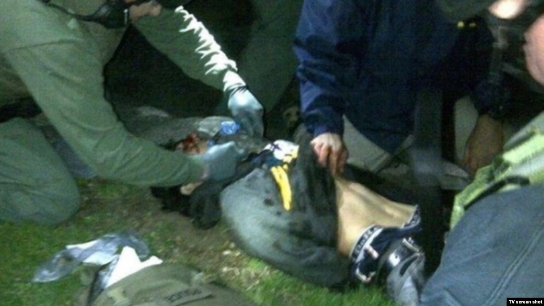 Boston Marathon bombing suspect Dzhokhar Tsarnaev lies injured as he is captured in Watertown, Massachusetts, on April 19.