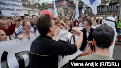 Thousands of protesters in Belgrade demanded that Mayor Sinisa Mali resign in the latest in a series of demonstrations against demolitions in a popular area marked for a real estate project financed by the United Arab Emirates.