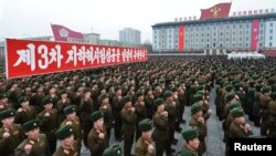 North Korean soldiers attend a rally celebrating the country's third nuclear test on Kim Il Sung Square in Pyongyang on February 14.