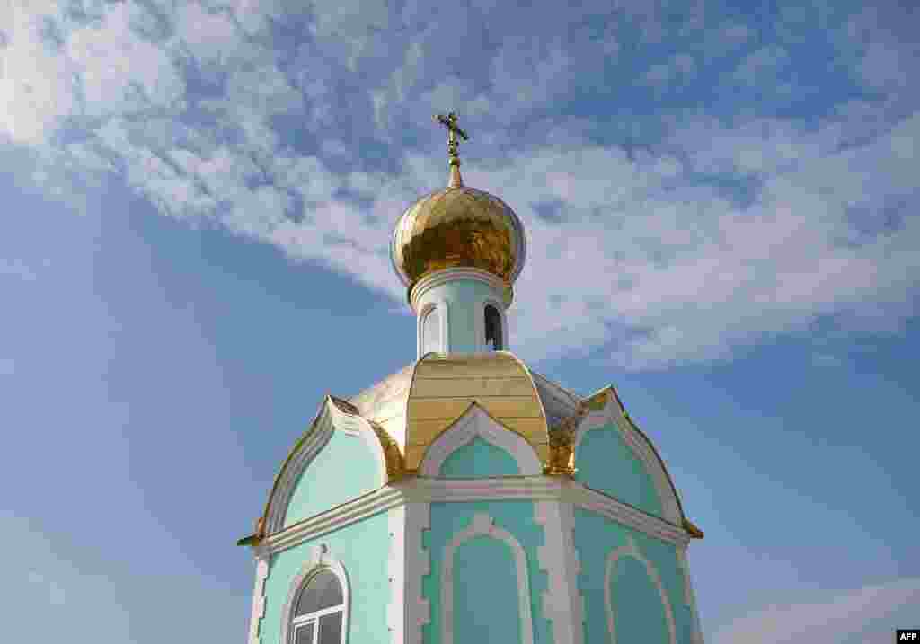 A Russian Orthodox chapel in the cemetery in Ceadir-Lunga. The Gagauz have ethnic Turkic roots, practice Orthodox Christianity, and speak both Russian and the Gagauz language.
