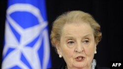 Madeleine Albright speaks to reporters at NATO headquarters in Brussels today after presenting her report to Secretary-General Anders Fogh Rasmussen.