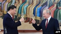 Си Цзиньпин и Владимир Путин на приеме в Кремле, март 2023 г.