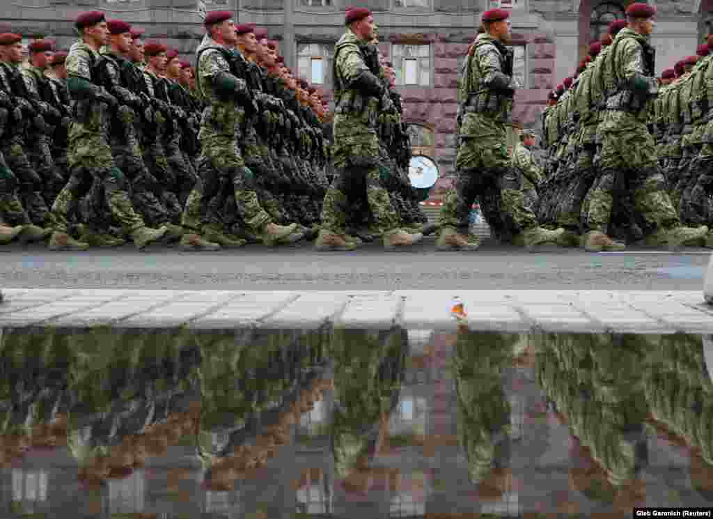 Ukrainian servicemen march during a rehearsal for the Independence Day military parade in central Kyiv.