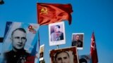 KAZAKHSTAN - ALMATY - IMMORTAL REGIMENT MARCH - VICTORY DAY - STALIN'S PORTRAIT
