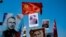 KAZAKHSTAN - ALMATY - IMMORTAL REGIMENT MARCH - VICTORY DAY - STALIN'S PORTRAIT
