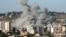Smoke rises from the site of a string of Israeli air strikes that targeted the southern Lebanese city of Nabatieh on June 20.