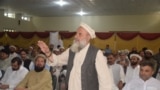 د جرګې یو مشر خپل نظر وړاندې کوي - د اګست ۱۱مې انځور 