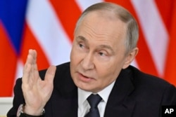 Володимир Путін