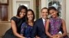 Президент Барак Обама аялы, биринчи канайым Мишель Обама жана эки кызы менен. 2011-жыл