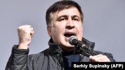 Former Georgian President and ex-Odesa Governor Mikheil Saakashvili speaks to opposition protesters outside Ukraine's parliament on October 22. 