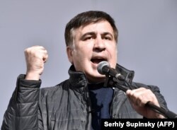 Former Georgian President and ex-Odesa Governor Mikheil Saakashvili speaks to opposition protesters outside Ukraine's parliament on October 22.