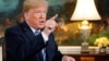 U.S. President Donald Trump speaks to reporters after signing a proclamation declaring his intention to withdraw from the JCPOA or Iran nuclear agreement in the Diplomatic Room at the White House in Washington, U.S. May 8, 2018. 