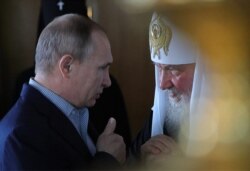 Президент Росії Володимир Путін (ліворуч) і Московський патріарх Кирило (архівне фото)