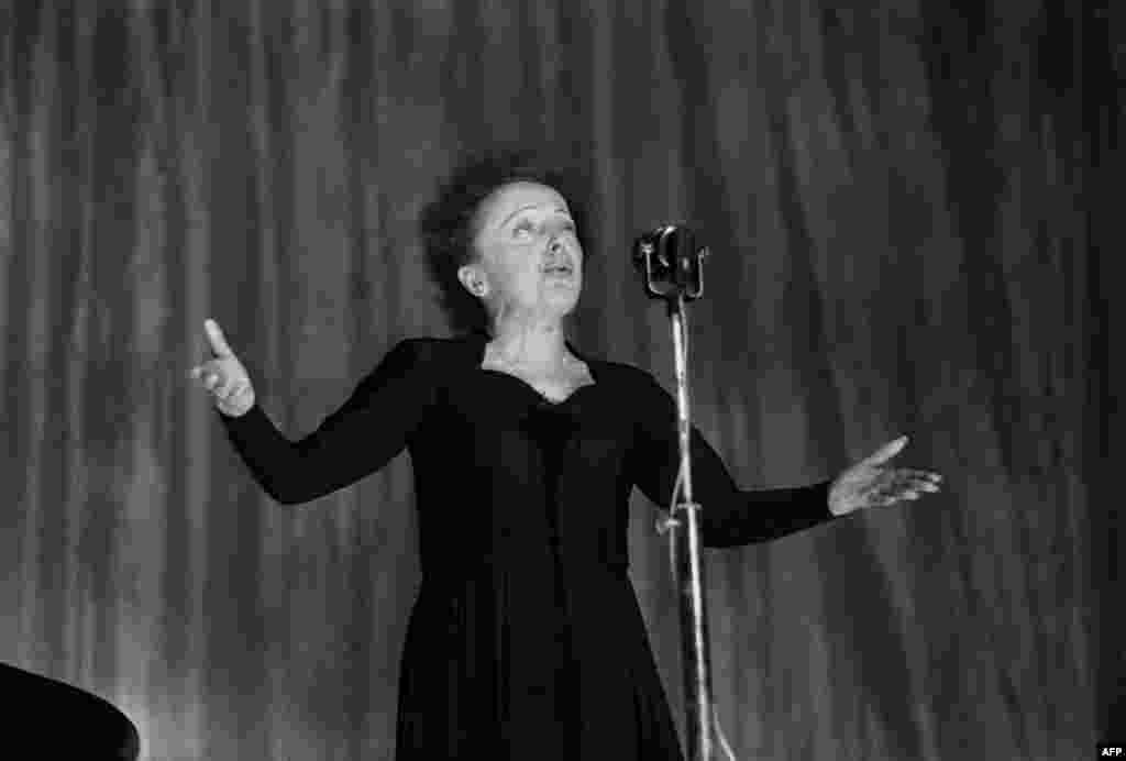 Piaf onstage at the Olympia during a show in Paris on December 30, 1960.
