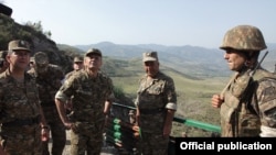 Armenia - Defense Minister Seyran Ohanian (second from left) inspects Armenian army positions on the border with Azerbaijan, 8Aug2012.