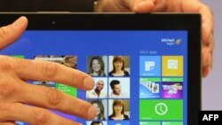 U.S. -- The Microsoft Windows 8 operating system is unveiled at a press conference in New York, 25Oct2012