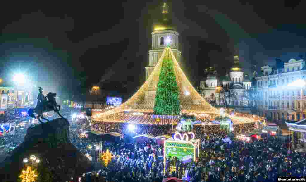 New Year&#39;s celebrations are held near St. Sophia Cathedral in Kyiv on January 1. (AP/Efrem Lukatskiy)