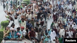 Supporters of the Islamist political party Tehrik-e-Labaik Pakistan demand the release of their leader and the expulsion of the French ambassador over cartoons depicting the Prophet Mohammed, in Lahore, Pakistan, on October 23. 