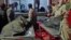 This video grab taken on January 15, 2026 from UGC images posted on social media on January 14, 2026 shows bodies lying on the stretchers outside the Forensic Diagnostic and Laboratory Center of Tehran Province in Kahrizak.