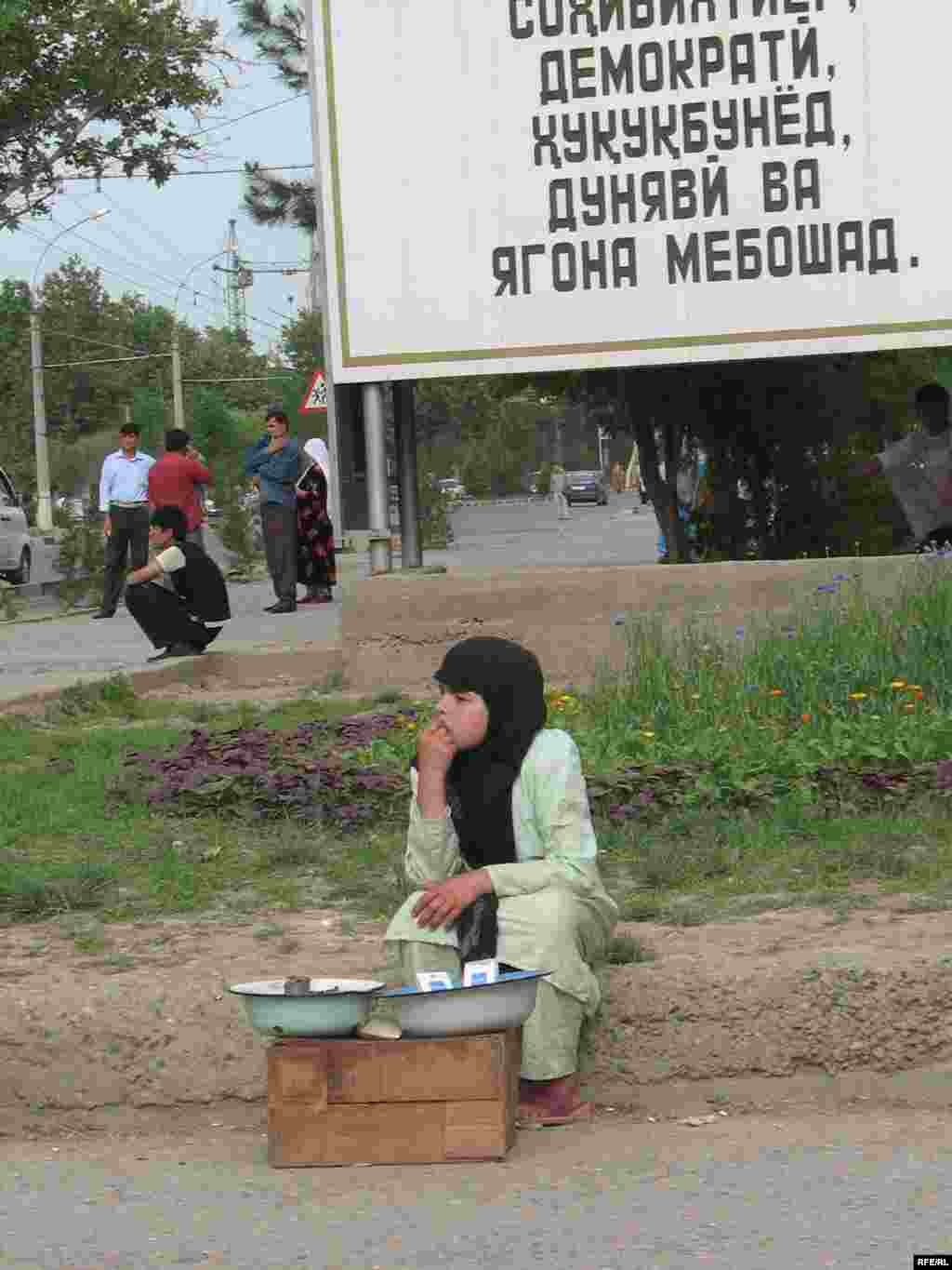  "Tajikistan is a country that is independent, democratic, secular, with rule of law and unity." -- billboard