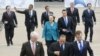 G8 leaders walk to the first working session at the G8 summit in Deauville, France, on May 26, the first of two days at the gathering.