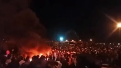 A video grab shows protests in the city of Sirjan in southern Iran against the increase in gasoline prices.
