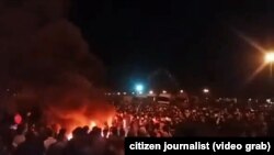 A video grab shows protest in the city of Sirjan in south Iran against the increase of gasoline prices. November 15, 2019