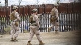 U.S. forces deploy along the U.S.-Mexico border near San Diego with Tijuana.