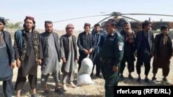 FILE: Militants surrender to Afghan forces in Jowzjan.