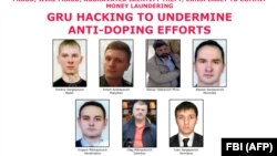 Подозреваемые в хакерских атаках россияне, которых разыскивает ФБР США.
