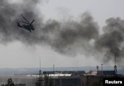 Вертолеты ВВС Украины атакуют сепаратистов, захвативших аэропорт Донцка. 26 мая