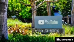 File photo - Company sign marks entrance to YouTube headquarters in San Bruno, CA.