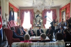 Vice President JD Vance (second from left) meets with British Foreign Secretary David Lammy (left) at Chevening House in Kent, England, on August 8.