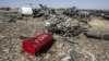 Debris is strewn in the desert at the site of the crash of Kogalymavia/Metrojet Flight 9268 on the Sinai Peninsula.