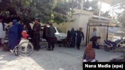 Patients are evacuated from a Red Cross hospital in Mazar-e Sharif on September 11, following an attack on a Spanish physiotherapist.
