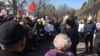 Activists rally in front of government headquarters in Bishkek on March 5 to demand reforms to the judicial system. 
