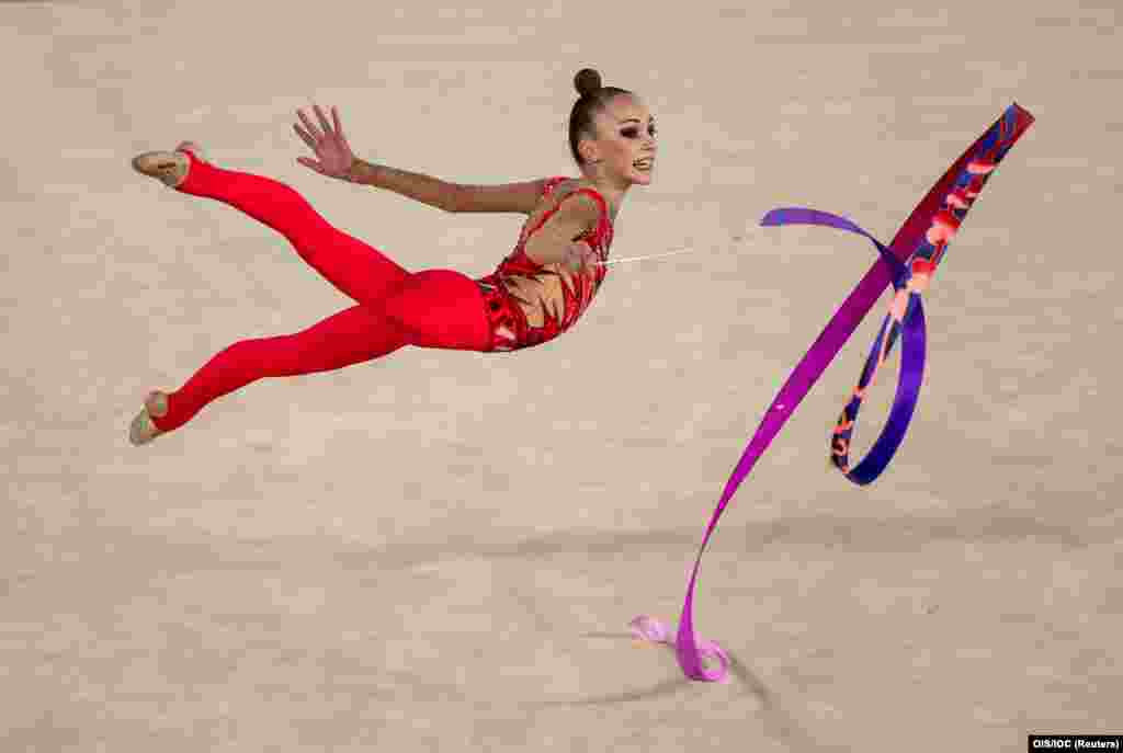 Khrystyna Pohranychna of Ukraine competes in the ribbon routine during the rhythmic gymnastics women&#39;s individual all-around during the Youth Olympic Games in Buenos Aires, Argentina, on October 16. (Reuters/Jed Leicester)