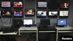 Afghanistan -- TV screens at Tolo TV, Kabul.