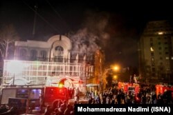 Iranian protesters gather outside the Saudi Embassy in Tehran during a demonstration against the execution of prominent Shi'ite Muslim cleric Nimr al-Nimr by Saudi authorities on January 2.