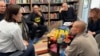 Lithuania - Svyatlana Tsikhanouskaya meets freed prisoners, including Syarhey Tsikhanouski and former RFE/RL journalist Ihar Karnei 