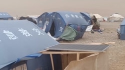 After Fleeing Floods, Afghans See Tents 'Torn To Pieces' By Windstorms