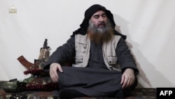 Человек, похожий на Абу Бакра аль-Багдади (кадр из видео). 