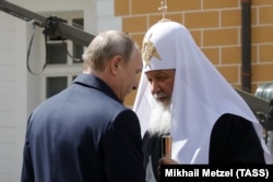 Президент России Владимир Путин и патриарх Кирилл. Москва, 4 мая 2017 года