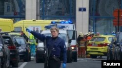 Police and emergency officers at a metro station in Brussels on March 22.