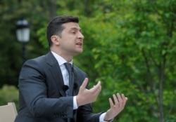 Zelenskiy still faces many of the same problems a year later.