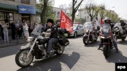 Bikers of the Russian motorcycle club Night Wolves leave the Russian Consulate in Brest, Belarus, after a press conference on April 28.