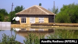 Homes in flood-hit Sabirabad district last May