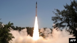 An Agni-IV strategic missile is launched from Wheeler island off the coast of the eastern Indian state of Orissa on September 19. 